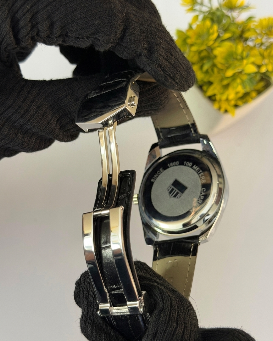 TAG Heuer Carrera Calibre 5 – Elegant Silver Dial with Black Leather Strap